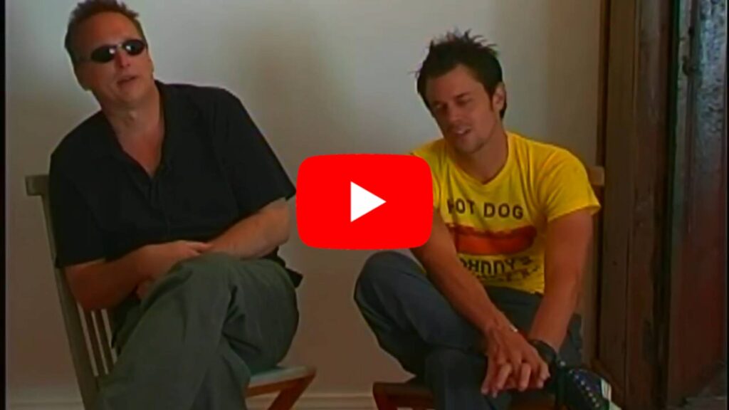 Roger Alan Wade sitting with Johnny Knoxville